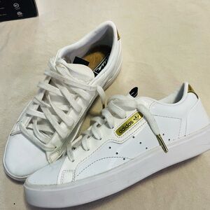 Adidas White Sneakers with Gold Accents